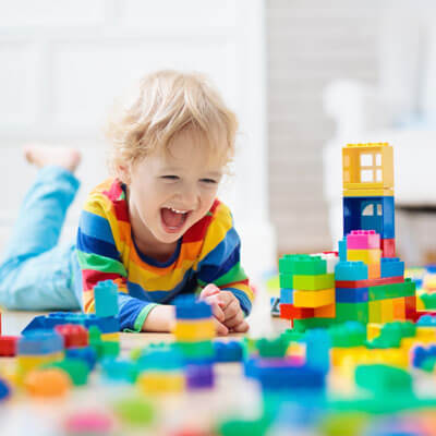 Toddler playing with blocks